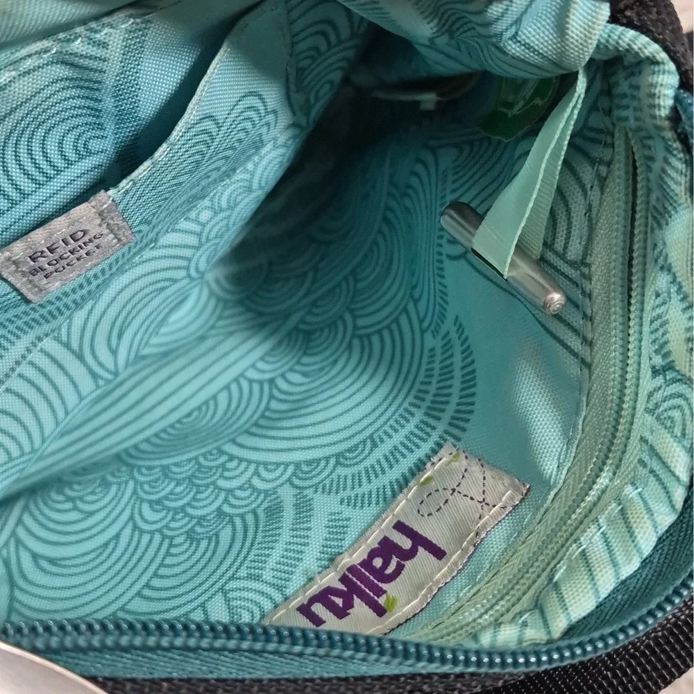 Haiku Impulse Crossbody Bag Black Green Multi-Pocket Travel Purse